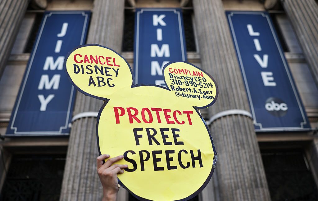 Disney logo displayed on a screen with a streaming subscription interface in the foreground