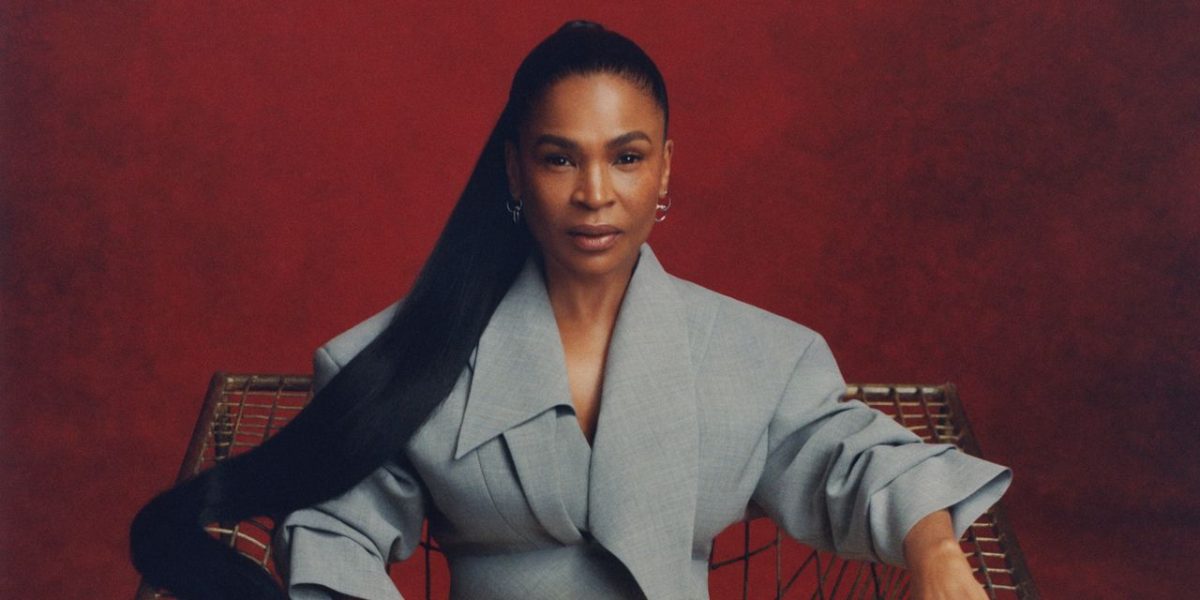 Nia Long attends a red carpet event in a black gown
