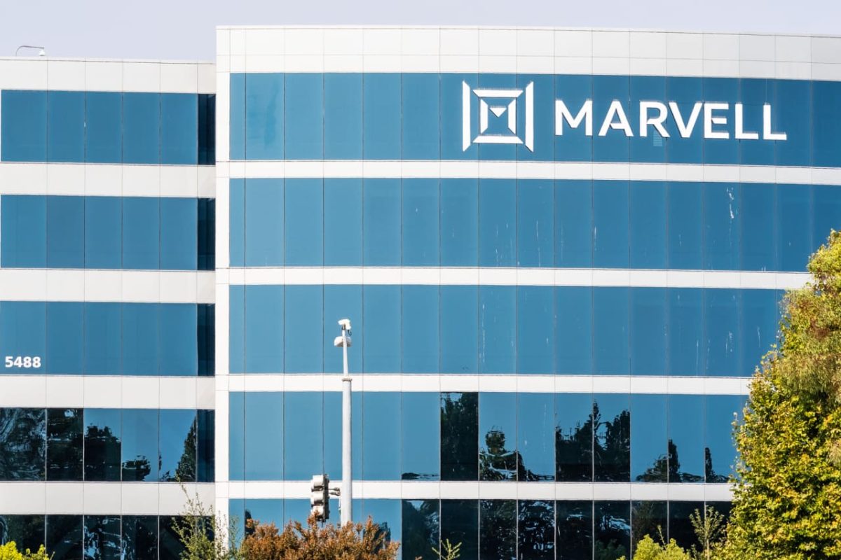 Marvell Technology semiconductor chip on a circuit board with stock chart overlay