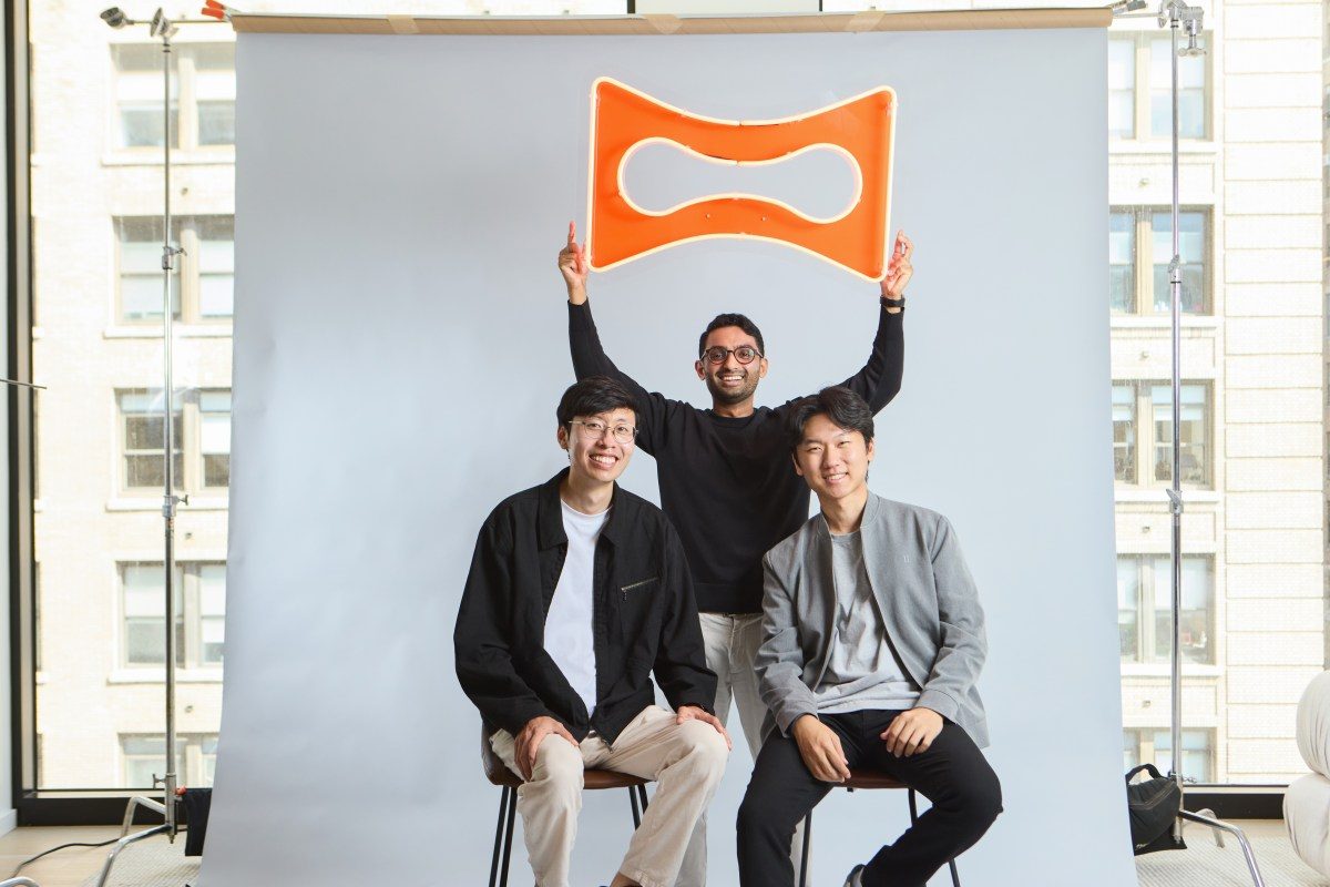 AI advertising platform startup founders celebrating new funding round for video generation tools