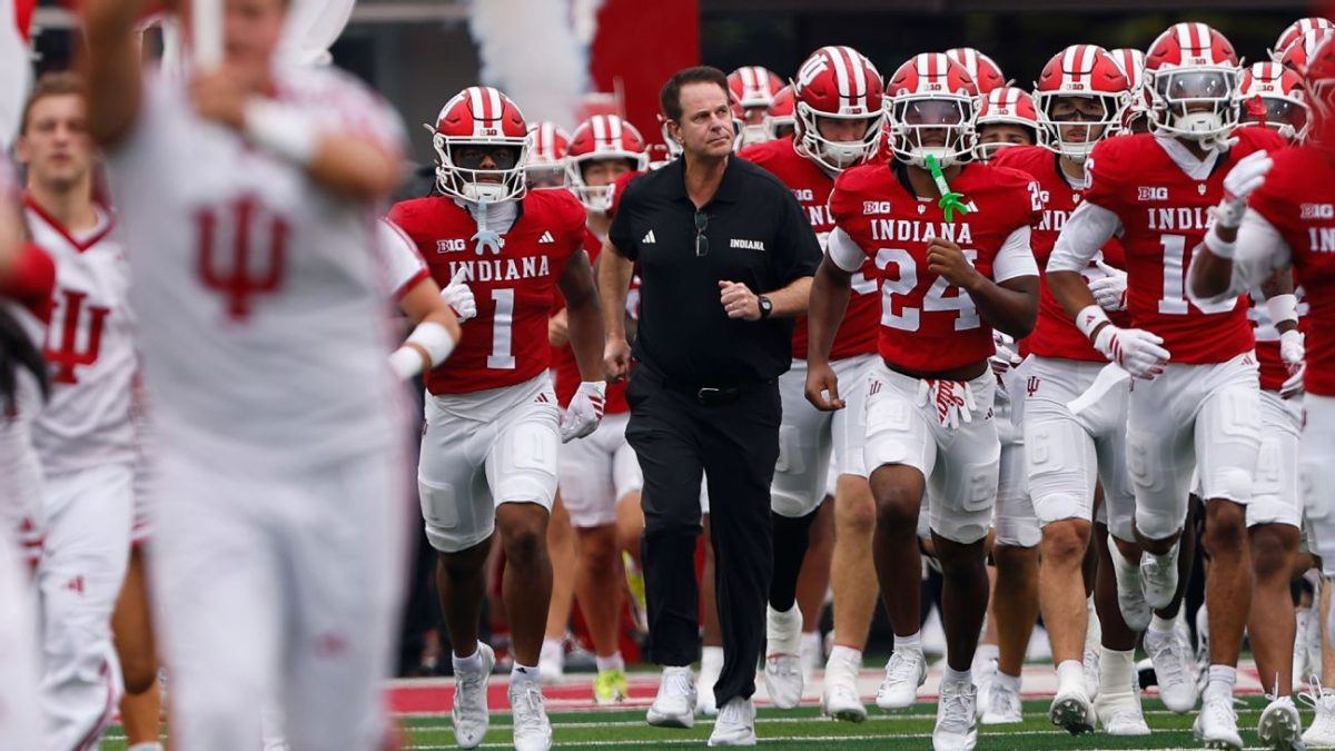 College football stadium packed with fans during a Big Ten conference game
