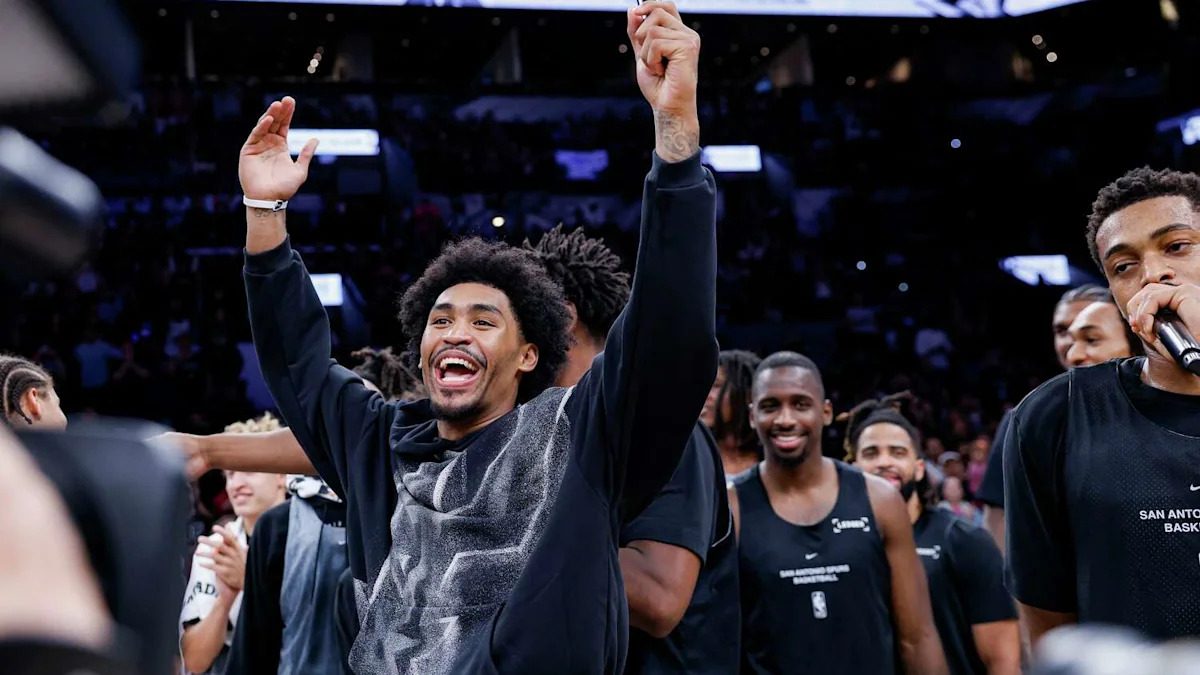 Spurs rookie guard Dylan Harper dribbles upcourt during an NBA game
