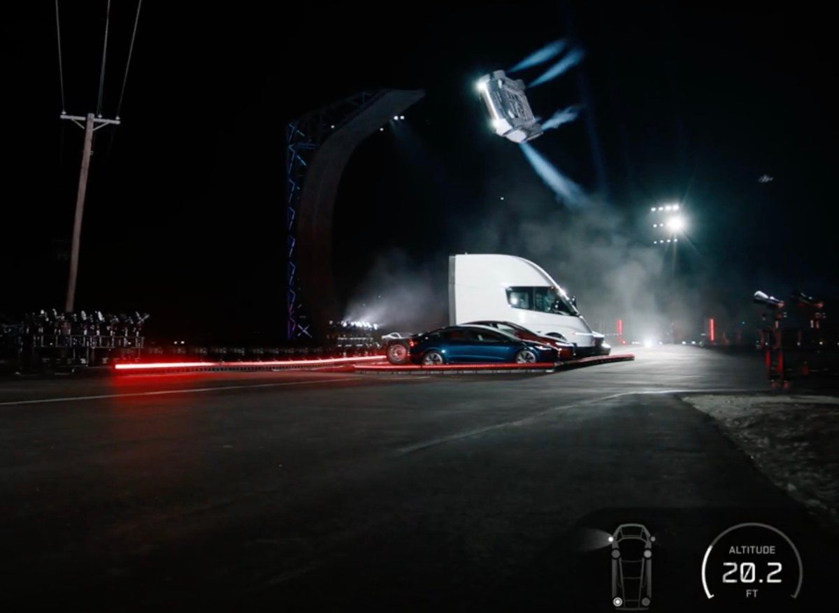 Red Tesla Roadster sports car with SpaceX cold gas thruster technology