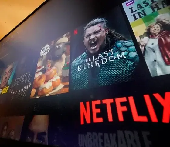 Netflix HQ glows red as investors celebrate record-shattering earnings and skyrocketing stock.